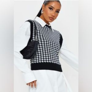 White and black vest